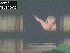 Spy Blonde Woman at the window